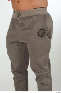 Joel dressed grey jogger pants sports thigh 0002.jpg